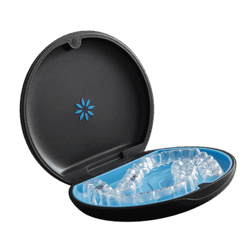 Black oval dental retainer case with blue gel cooling insert inside, open position displayed.